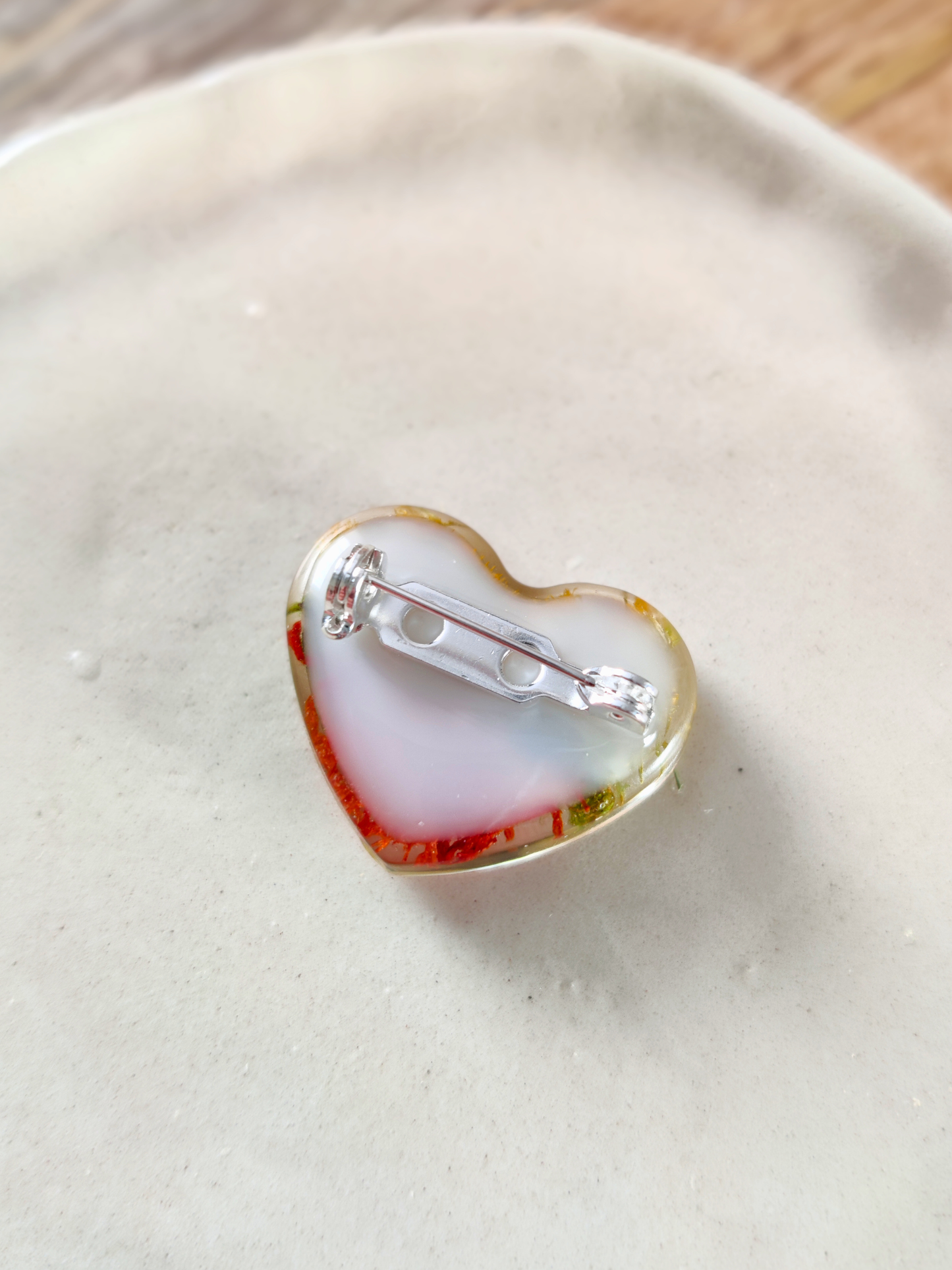 Ethnic heart-shaped brooch