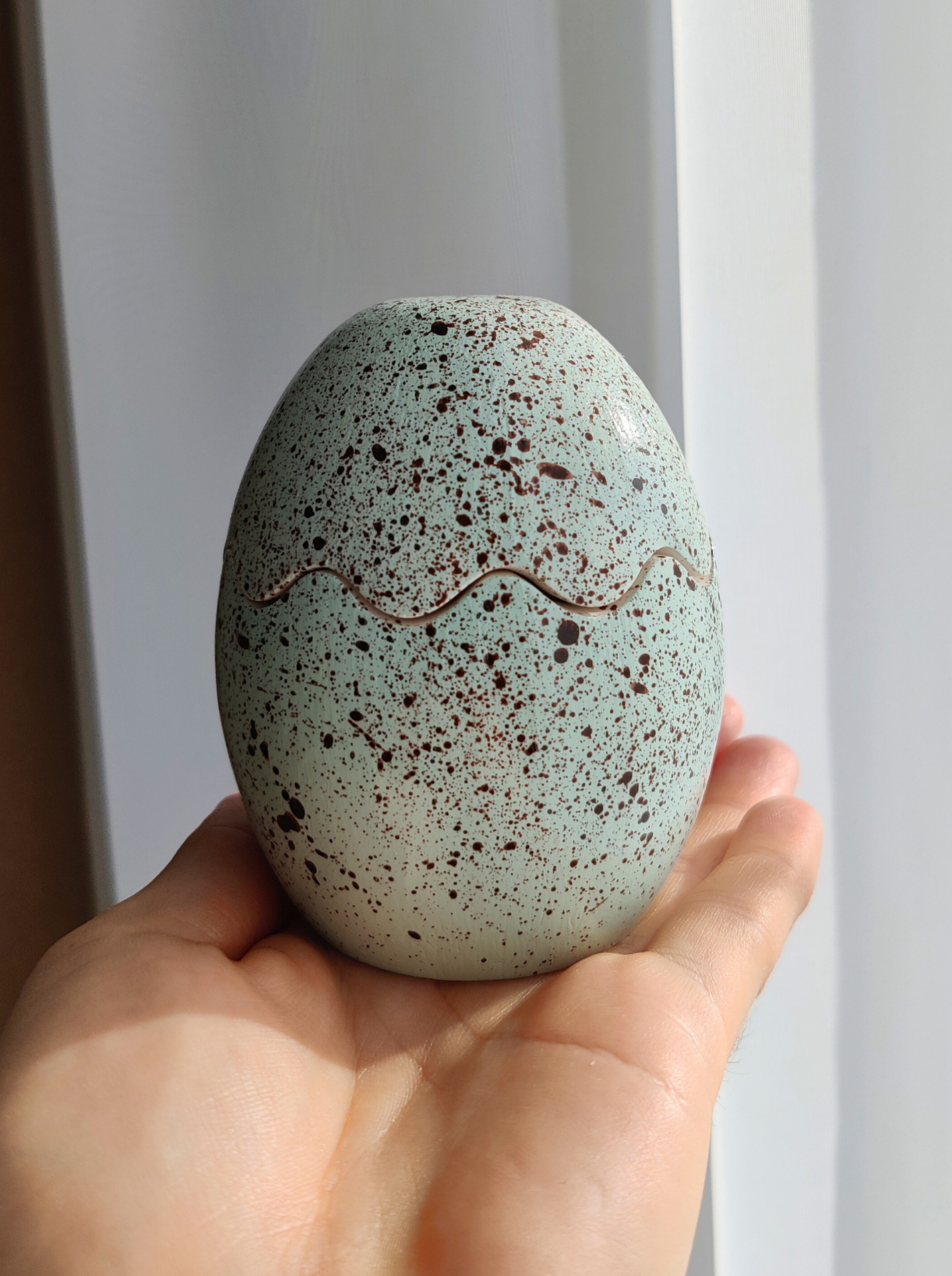 Easter beeswax candle in a jar "Margutis", green-blue.