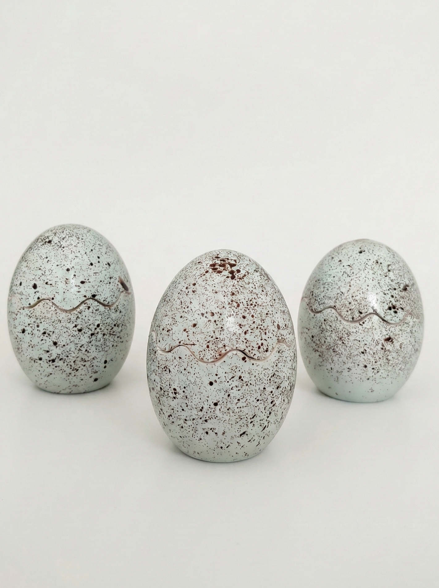 Easter beeswax candle in a jar "Margutis", green-blue.